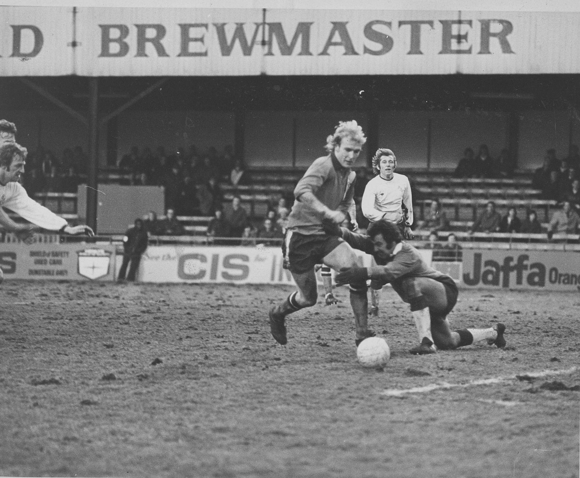 Ron Futcher about to be fouled for a late penalty