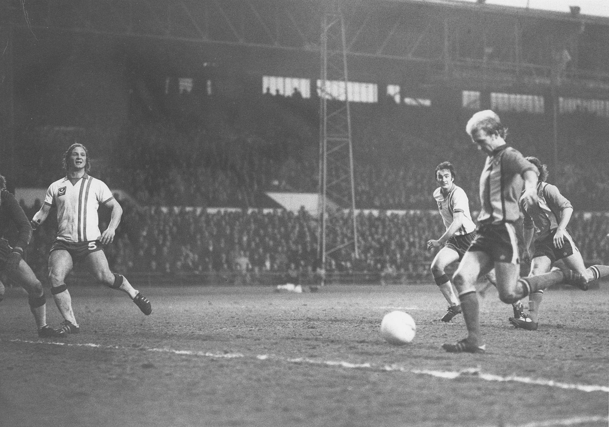 Ron Futcher about to slot in the third goal