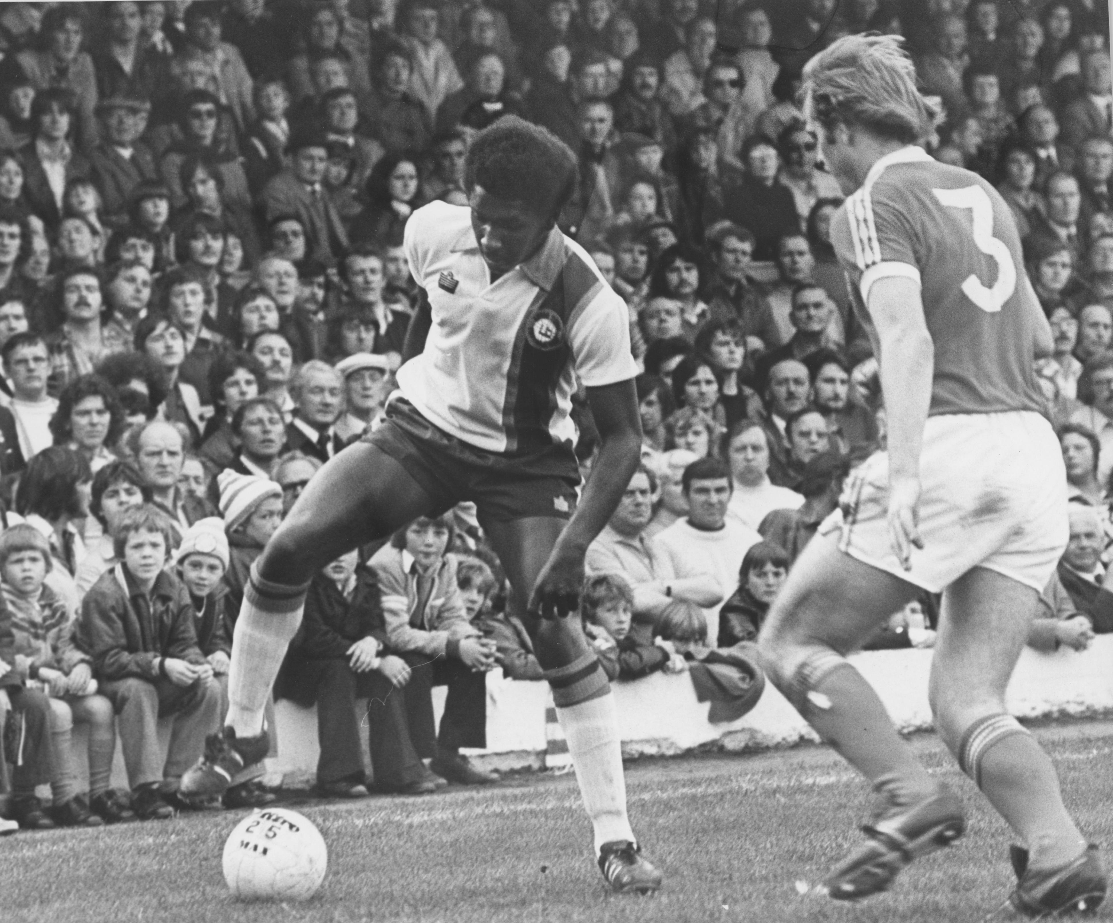 Ricky Hill controls the ball